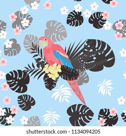 Isolated parrots seamless pattern with tropical leaves and flowers.