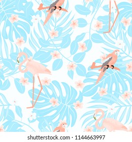 Isolated parrots seamless pattern with tropical leaves and flowers.