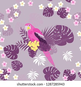 Isolated parrots seamless pattern with tropical leaves and flowers.