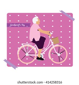 Isolated photo with a grandmother riding a bicycle on a white background