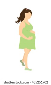 Isolated pregnant woman on white background. Woman in green dress is awaiting for baby. Happy maternity.