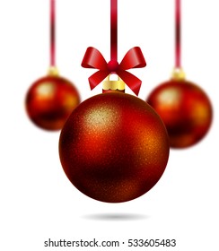 Isolated red Christmas ball hanging on a ribbon