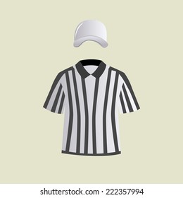 an isolated referee uniform on a light green background