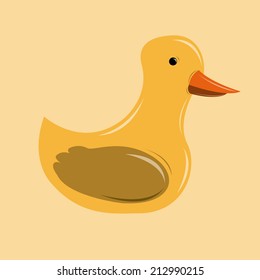 an isolated rubber duck on a light yellow background