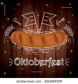 Isolated sausage on a wooden background with chalk flags Oktoberfest
