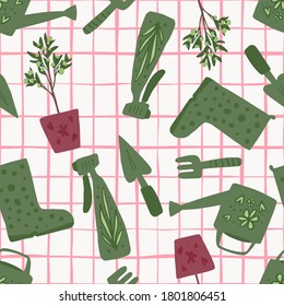 Isolated seamless garden tools silhouettes pattern. Green elements on white background with pink check. Designed for wallpaper, textile, wrapping paper, fabric print. Vector illustration.