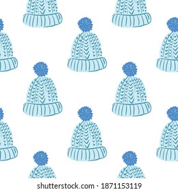 Isolated seamless pattern with blue doodle cozy hat ornament. White background. Flat vector print for textile, fabric, giftwrap, wallpapers. Endless illustration.