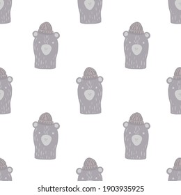 Isolated seamless pattern with pastel purple bear head print. White background. Childish backdrop. Vector illustration for seasonal textile prints, fabric, banners, backdrops and wallpapers.