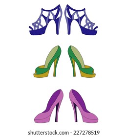 isolated set of three pair shoes