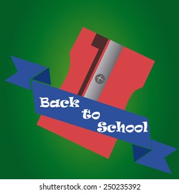 an isolated sharpener and a ribbon with text on a green background