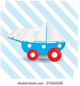 Isolated ship toy on a blue textured background
