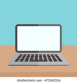 Isolated simple laptop on table. Blank screen.