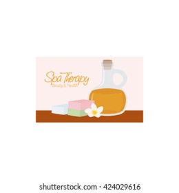 Isolated spa business card with a flask of lotion, text, a flower and soaps