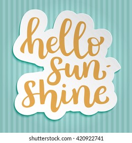 Isolated sticker with hand drawn brush ink lettering "hello sunshine" on blue retro background with vertical strips. Vector calligraphy for your design, advertising, goods, package, catalog design