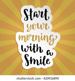 Isolated sticker with hand drawn ink lettering "Start your morning with a smile" on vintage background with retro sunburst. Vector calligraphy design for banners, posters, coffee menu, advertising.