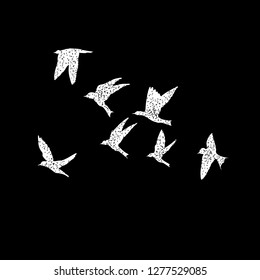 Isolated textured stipple silhouette of white birds flock in the black air Inspirational body flash tattoo ink. Vector.