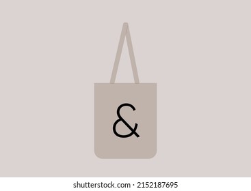 An isolated tote bag with a graphic symbol on it