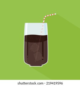 an isolated transparent glass with cola on a green background