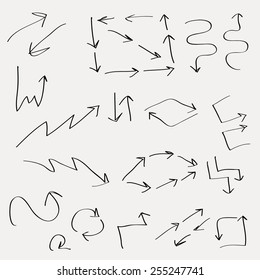 Isolated vector hand drawn arrows set on light background