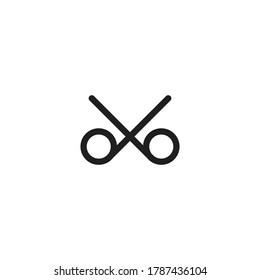 Isolated Vector Illustration. A black symbol of a scissor