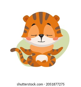 Isolated vector illustration of cartoon tiger cub meditating in lotus position. Image in fun flat style for print and digital use.