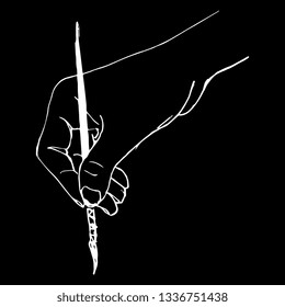 Isolated vector illustration. Human hand holding a painting brush or a pen. Hand drawn linear ink sketch. White silhouette on black background.