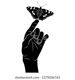 Isolated vector illustration. Human hand holding a butterfly. Black and white silhouette.