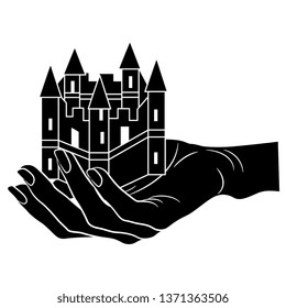 Isolated vector illustration. Humand hand holding a medieval castle. Black and white silhouette.