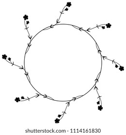 Isolated vector illustration. Round floral frame with meadow flowers. Black silhouette on white background.