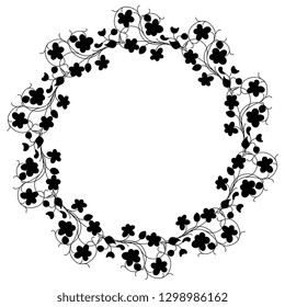 Isolated vector illustration. Round floral decor or frame. Wreath of stylized flowers. Vintage style. Black silhouette on white background.