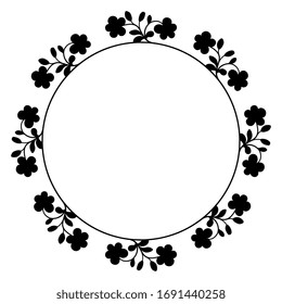 Isolated vector illustration. Round floral frame or decor with stylized flower branches. Folk style. Black silhouette on white background.