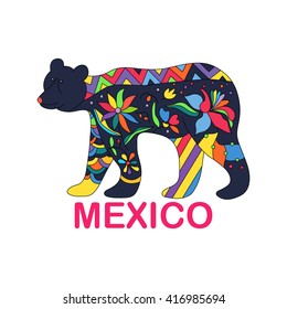Isolated vector image of Mexican animal. Black bear traditional Mexican animal in colorful colors and flowers. Vector illustration.