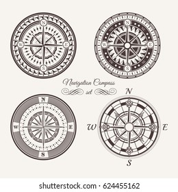 Isolated vintage or old marine compass rose icons. Sea or ocean navigation. Retro cartography icon or traveler compass sign, wind rose icon set.