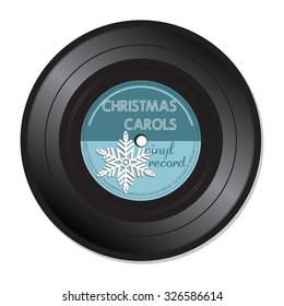Isolated vinyl record with snowflake and the text Christmas Carols written on the record