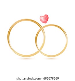 Isolated Wedding gold rings with gemstone heart shape