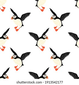 Isolated wildlife nature seamless pattern with black and white colored puffin bird ornament. White background. Flat vector print for textile, fabric, giftwrap, wallpapers. Endless illustration.