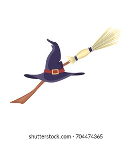 Isolated witch hat and broom on white background..