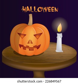 an isolated wooden table with a pumpkin and a candle with fire