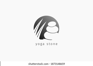 isolated yoga stone logo with two ply palm leaves in negative circle logo to boost positive, balancing mind. suitable for meditation class, massage, spa, resort