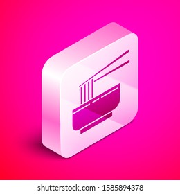 Isometric Asian noodles in bowl and chopsticks icon isolated on pink background. Street fast food. Korean, Japanese, Chinese food. Silver square button. Vector Illustration