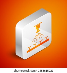 Isometric Automatic irrigation sprinklers icon isolated on orange background. Watering equipment. Garden element. Spray gun icon. Silver square button. Vector Illustration