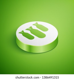 Isometric Aviation bombs icon isolated on green background. Rocket bomb flies down. White circle button. Vector Illustration