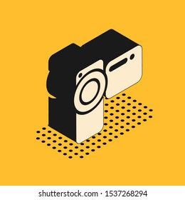 Isometric Cinema camera icon isolated on yellow background. Video camera. Movie sign. Film projector.  Vector Illustration