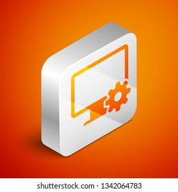 Isometric Computer monitor and gear icon isolated on orange background. Adjusting app, setting options, maintenance, repair, fixing monitor concepts. Silver square button. Vector Illustration