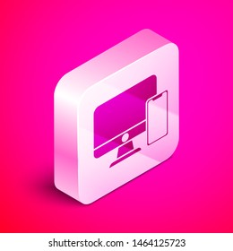 Isometric Computer monitor and mobile phone icon isolated on pink background. Earnings in the Internet, marketing. Silver square button. Vector Illustration