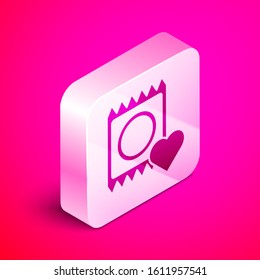 Isometric Condom in package icon isolated on pink background. Safe love symbol. Contraceptive method for male. Silver square button. Vector Illustration