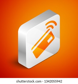 Isometric Contactless payment with nfc card icon isolated on orange background. Card with radio wave sign. Credit card payment. Silver square button. Vector Illustration