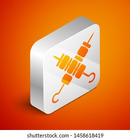 Isometric Crossed grilled shish kebab on skewers stick icon isolated on orange background. Meat kebab on skewers stick. Picnic with grill meat. Silver square button. Vector Illustration