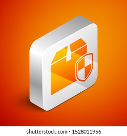 Isometric Delivery pack security symbol with shield icon isolated on orange background. Delivery insurance. Insured cardboard boxes beyond the shield. Silver square button. Vector Illustration
