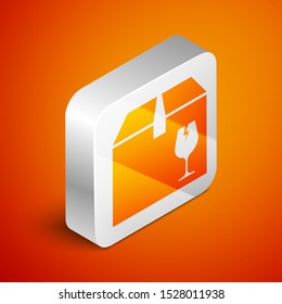 Isometric Delivery package box with fragile content symbol of broken glass icon isolated on orange background. Box, package, parcel sign. Silver square button. Vector Illustration